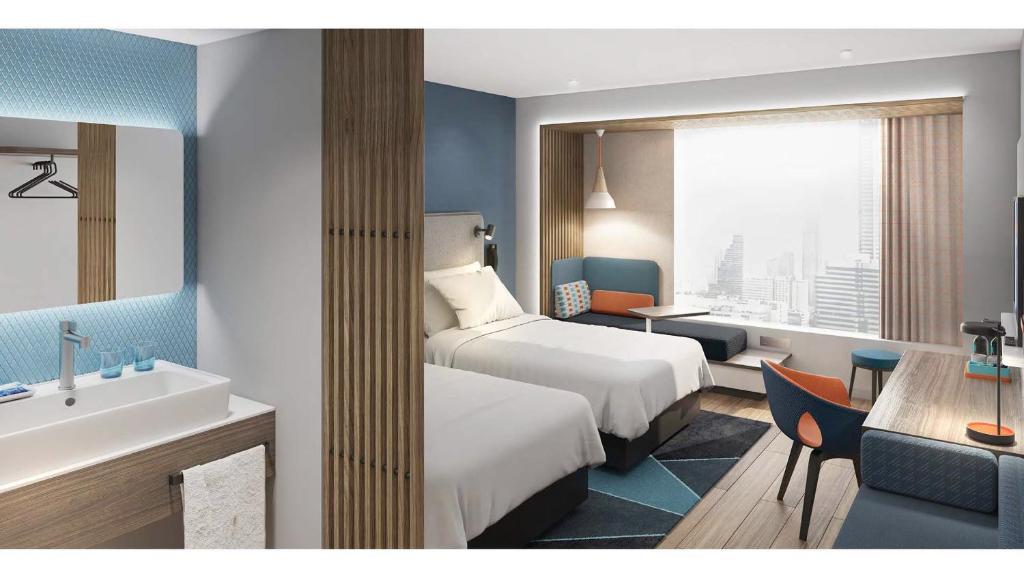 Postel nebo postele na pokoji v ubytování Holiday Inn Express Shijiazhuang High-tech Zone by IHG