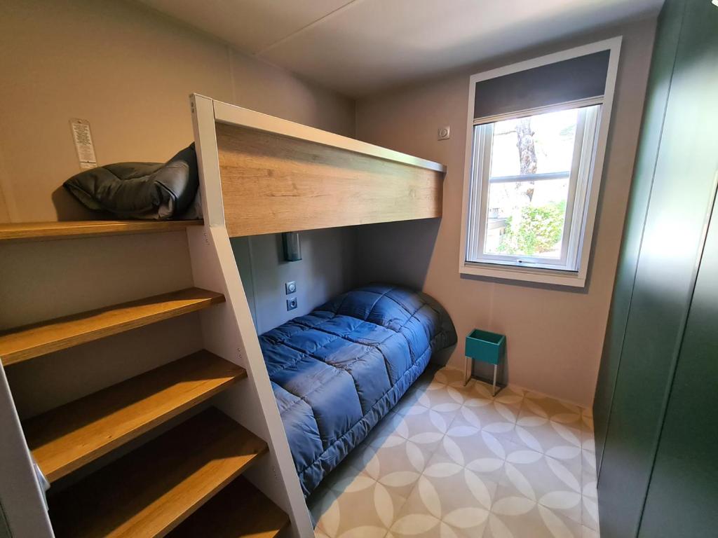 Postel nebo postele na pokoji v ubytování Le Beau Vezé