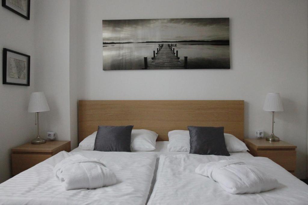 Łóżko lub łóżka w pokoju w obiekcie apartmán Relax Frymburk