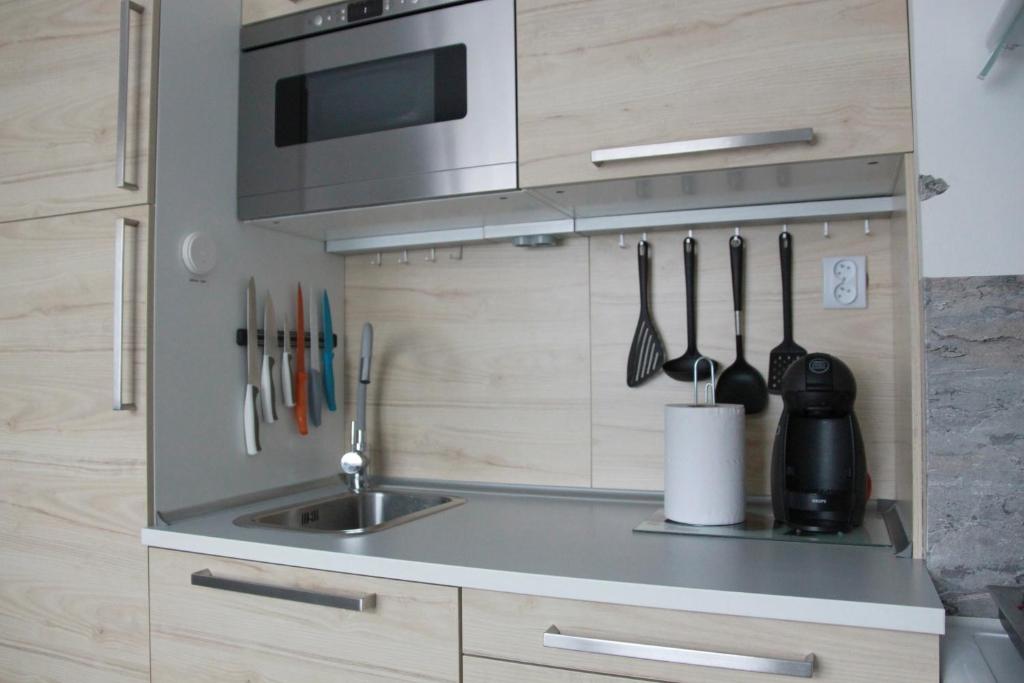 Kuchnia lub aneks kuchenny w obiekcie apartmán Relax Frymburk