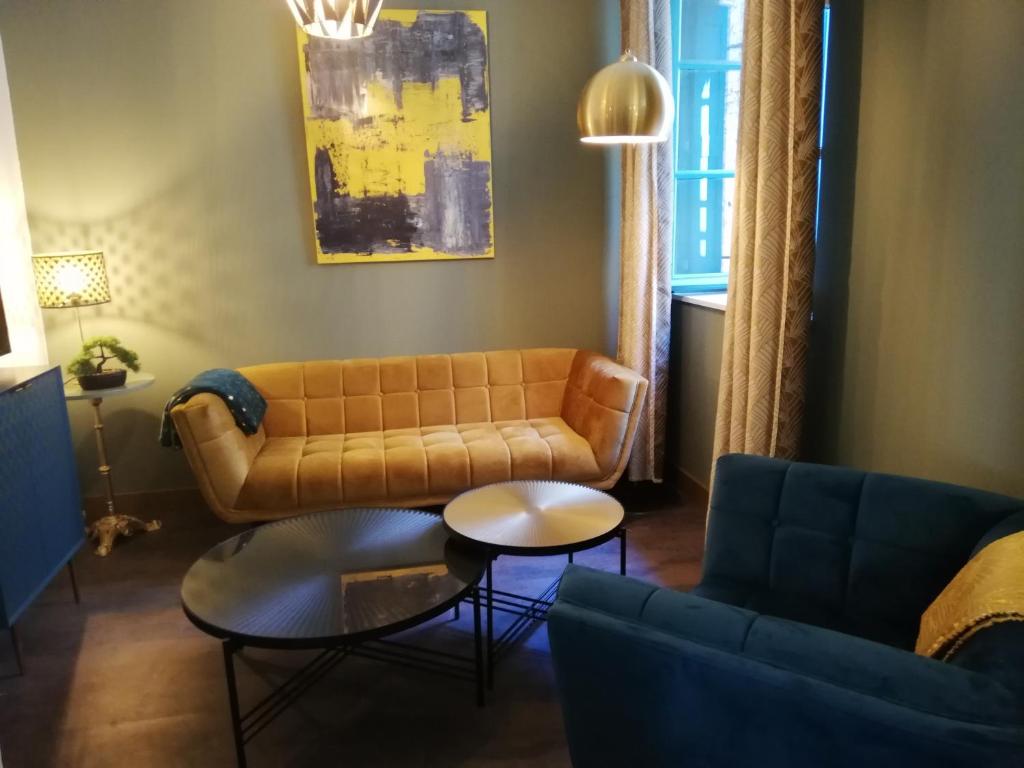 Posezení v ubytování Appartement sous les remparts