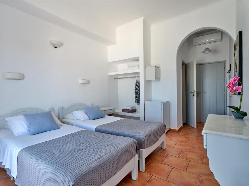 Letto o letti in una camera di Hotel Galini