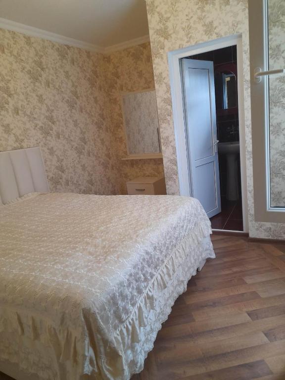 Postel nebo postele na pokoji v ubytování Guest House IVO