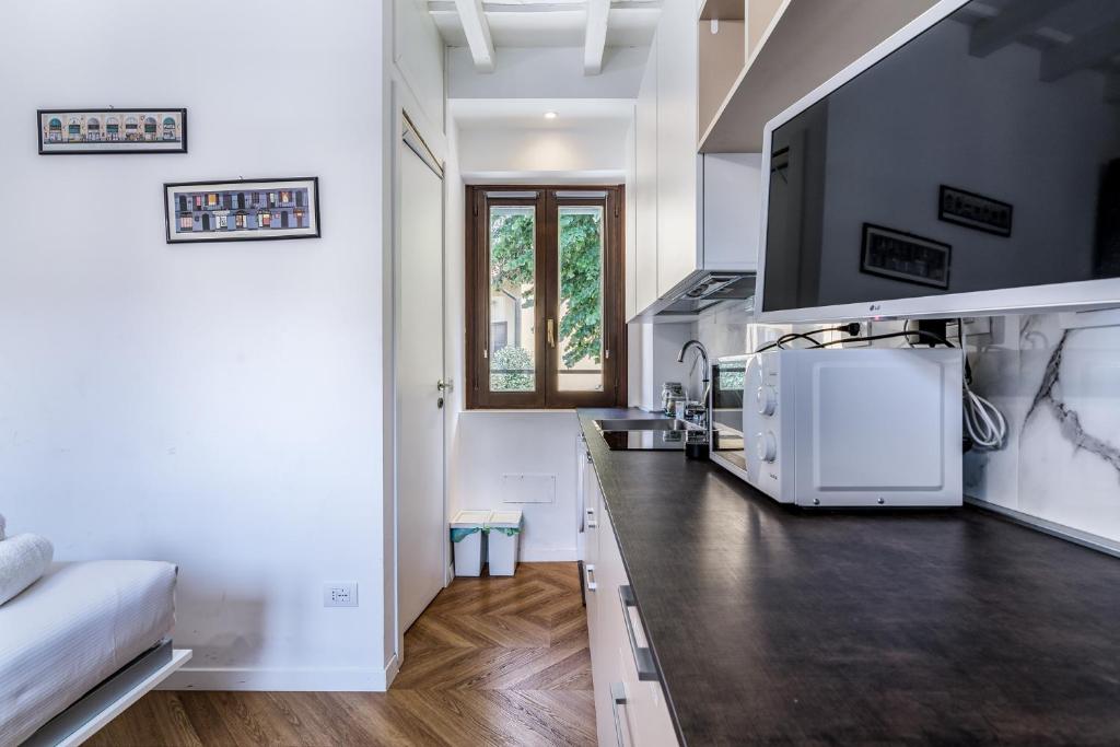 Kuchyňa alebo kuchynka v ubytovaní Morimondo Studio Apartment