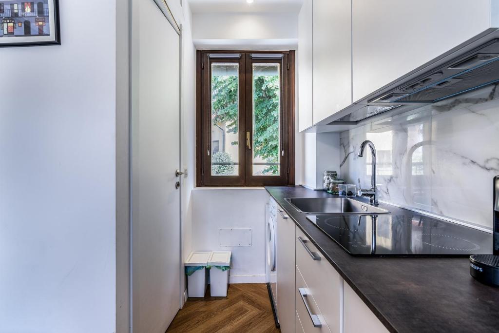 Kuchyňa alebo kuchynka v ubytovaní Morimondo Studio Apartment