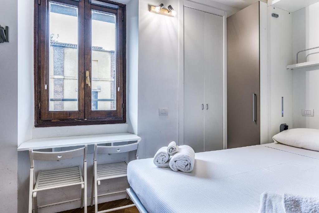 Posteľ alebo postele v izbe v ubytovaní Morimondo Studio Apartment