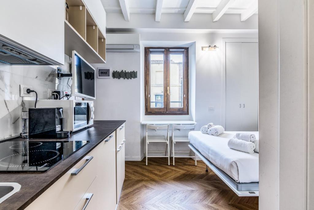 Kuchyňa alebo kuchynka v ubytovaní Morimondo Studio Apartment