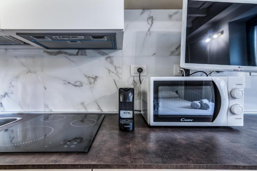 Kuchyňa alebo kuchynka v ubytovaní Morimondo Studio Apartment