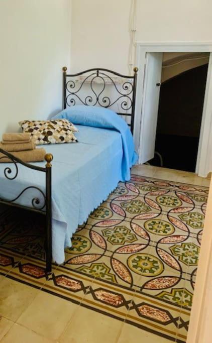 Postel nebo postele na pokoji v ubytování Casina foggia dell'albero