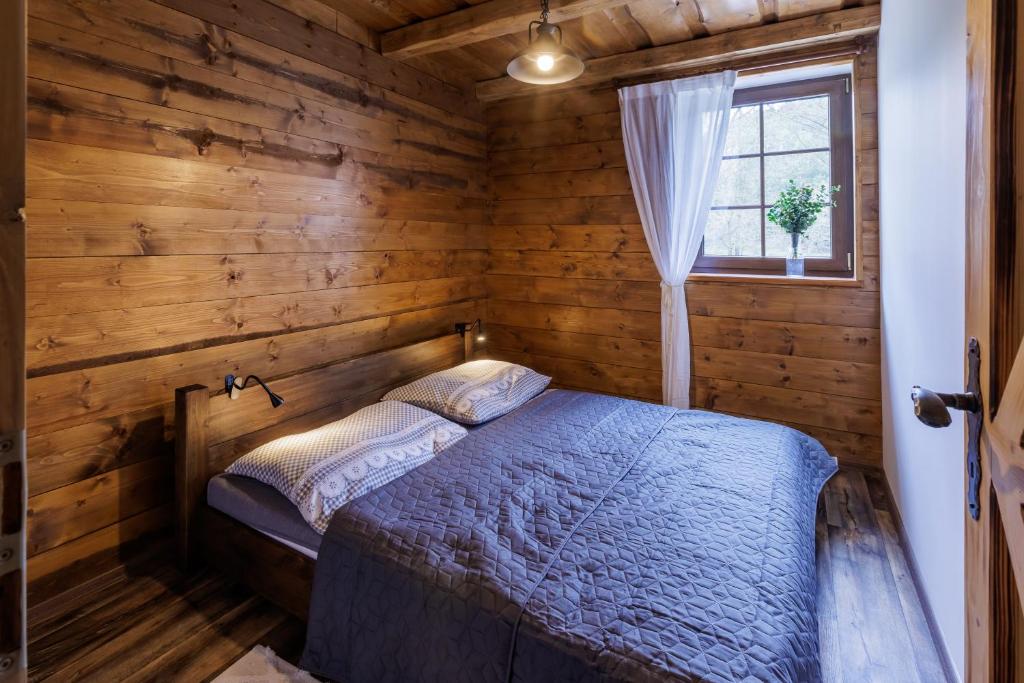 Postel nebo postele na pokoji v ubytování Rabasův Mlýn