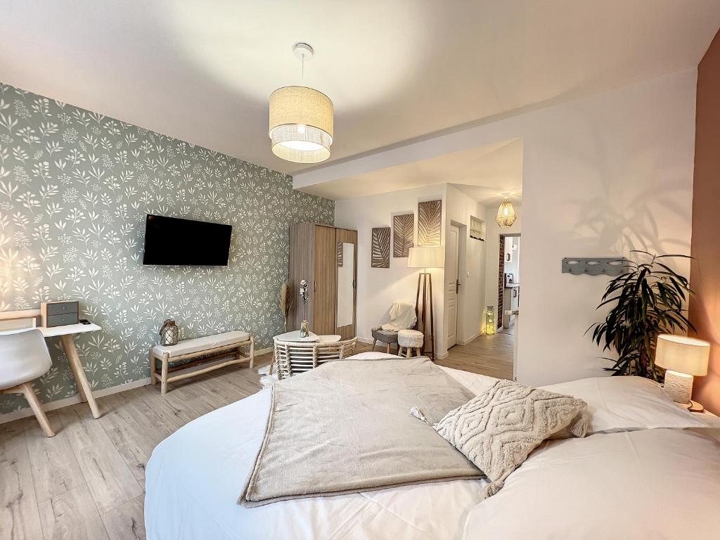 Postel nebo postele na pokoji v ubytování Appart LE SCANDINAVE - Maison 1911 - confort & prestige