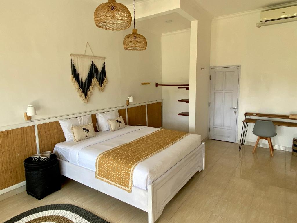 Postel nebo postele na pokoji v ubytování Bella Bali