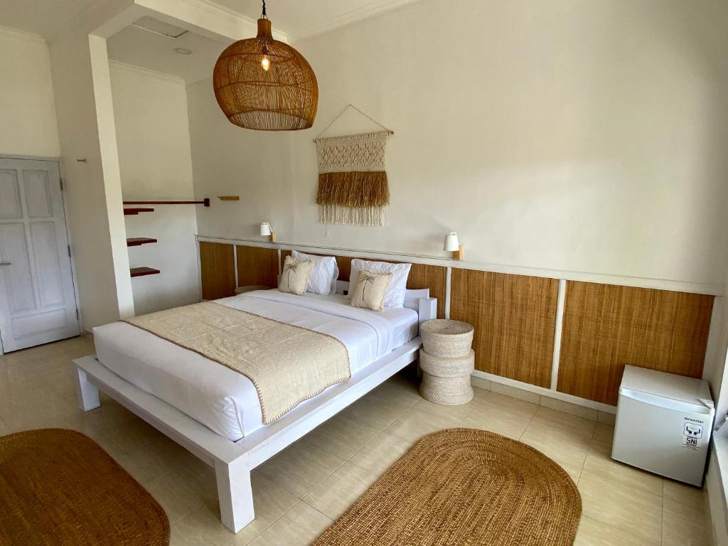 Postel nebo postele na pokoji v ubytování Bella Bali