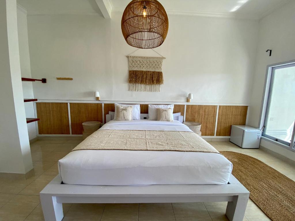 Postel nebo postele na pokoji v ubytování Bella Bali