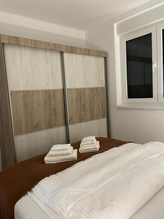 Postel nebo postele na pokoji v ubytování Apartman Splendid