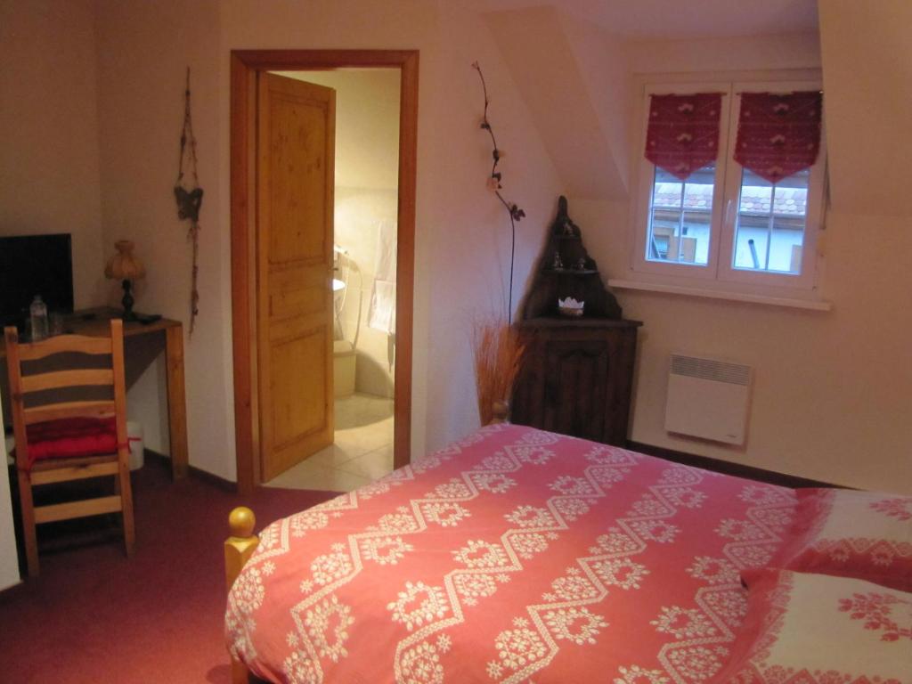 Postel nebo postele na pokoji v ubytování Maison d'Hôtes Douce Nuit