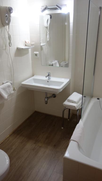 Koupelna v ubytování Hotel Vicente