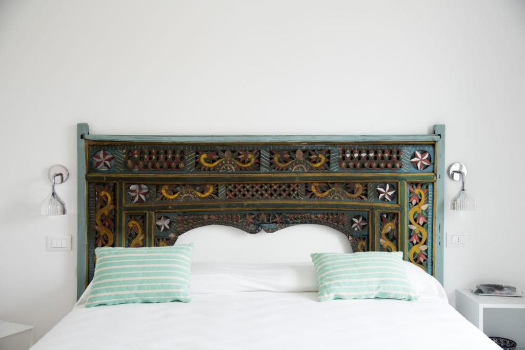 Voodi või voodid majutusasutuse Bed & Breakfast A Mare affitta camere toas