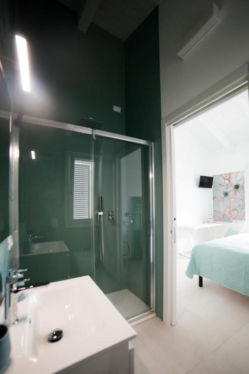 Voodi või voodid majutusasutuse Bed & Breakfast A Mare affitta camere toas