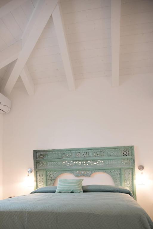 Voodi või voodid majutusasutuse Bed & Breakfast A Mare affitta camere toas
