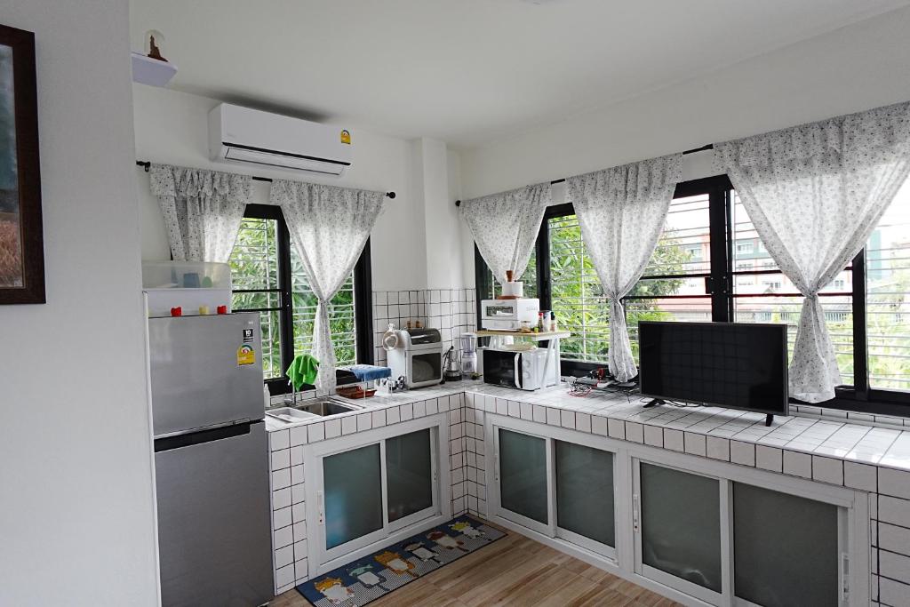 Kuchyň nebo kuchyňský kout v ubytování Khod’s House