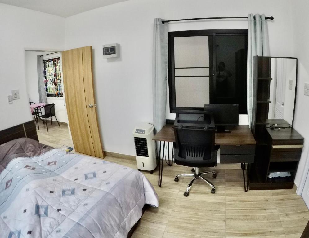 Postel nebo postele na pokoji v ubytování Khod’s House