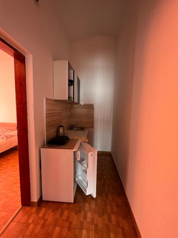 Kuchyň nebo kuchyňský kout v ubytování Green Villa