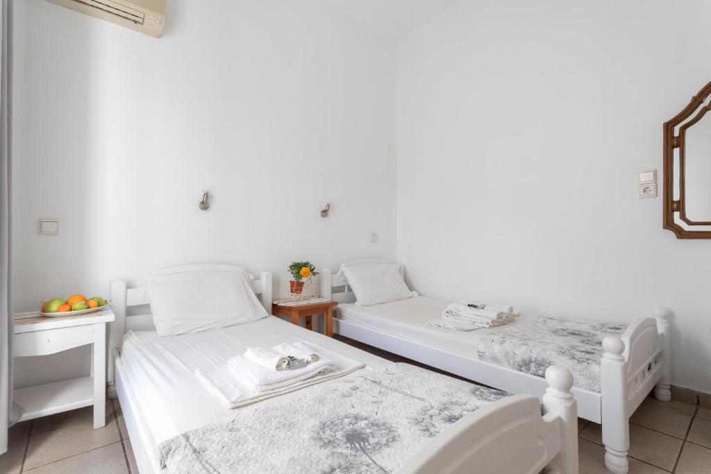 Voodi või voodid majutusasutuse Unforgettable Return To Timeless Spetses toas