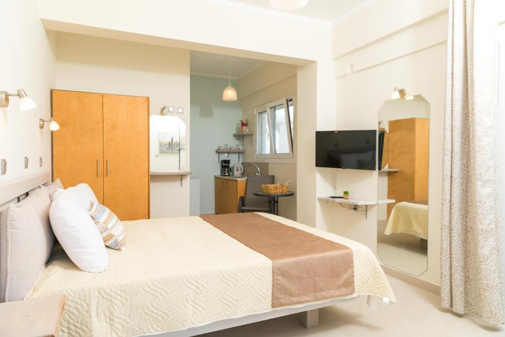 TV a/nebo společenská místnost v ubytování Vasileios Seaview Apartments