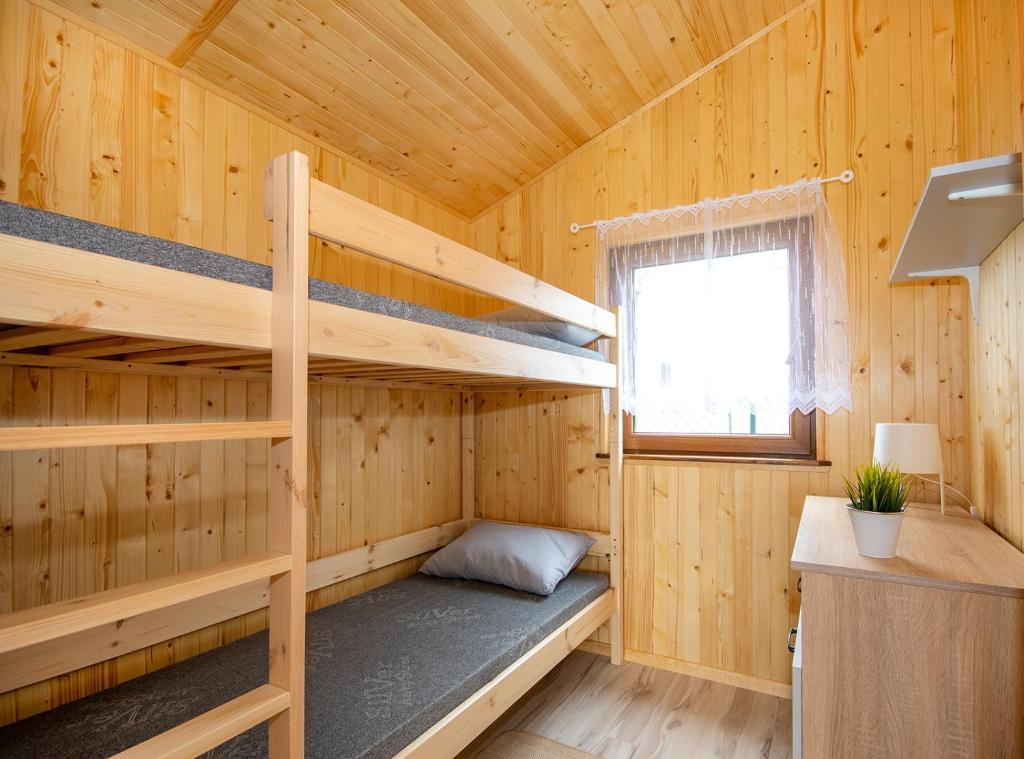 Kuchyň nebo kuchyňský kout v ubytování Domki pod wzgórzem