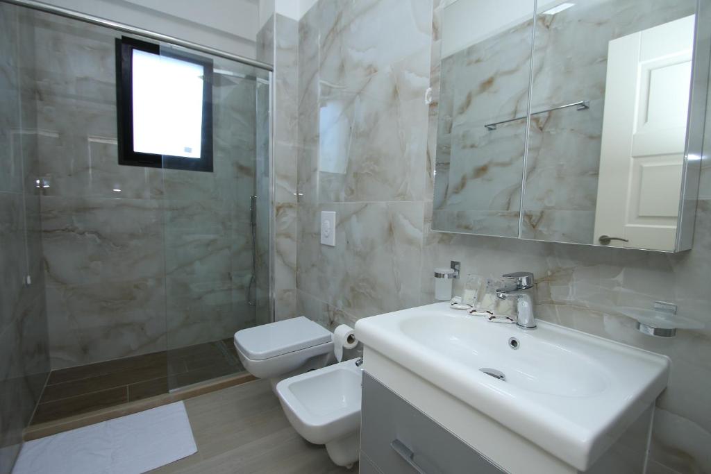 Koupelna v ubytování Hotel Roalb