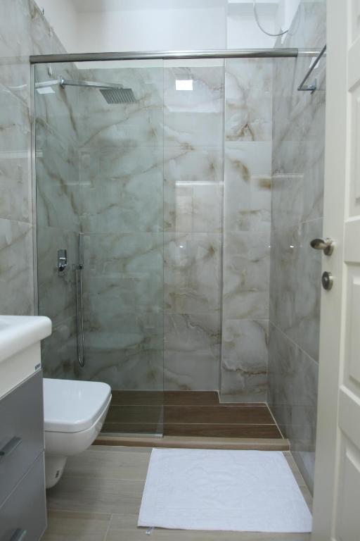 Koupelna v ubytování Hotel Roalb