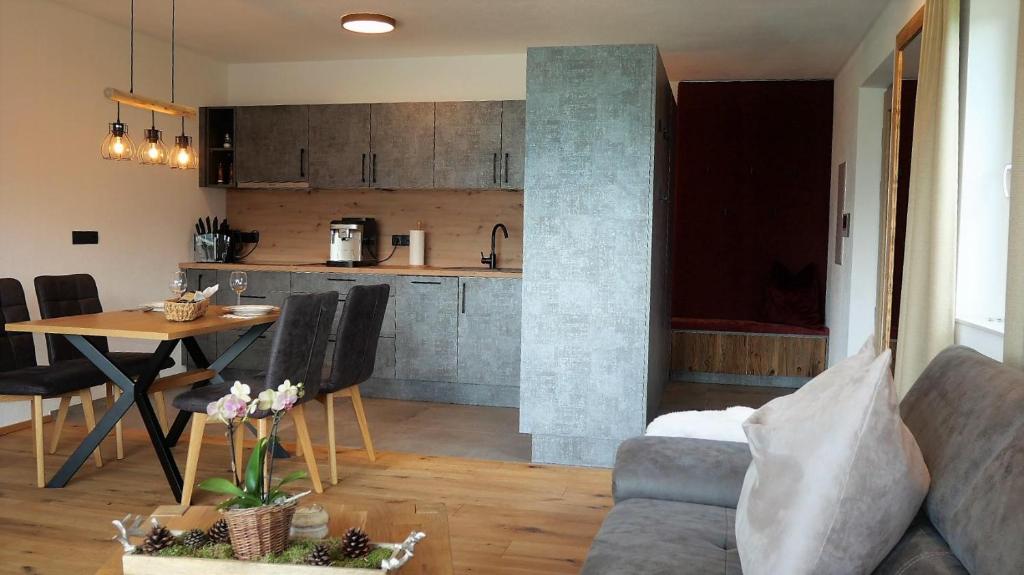 Kuchyň nebo kuchyňský kout v ubytování Appartements Plus
