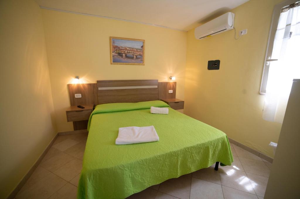 Postel nebo postele na pokoji v ubytování Coppola Rossa Relax