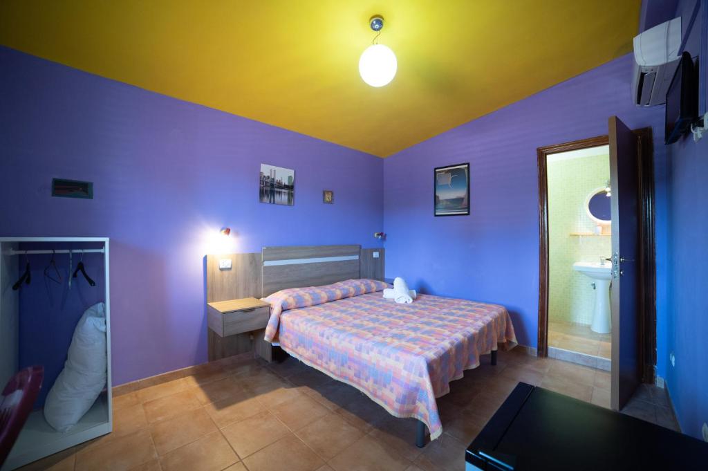 Postel nebo postele na pokoji v ubytování Coppola Rossa Relax