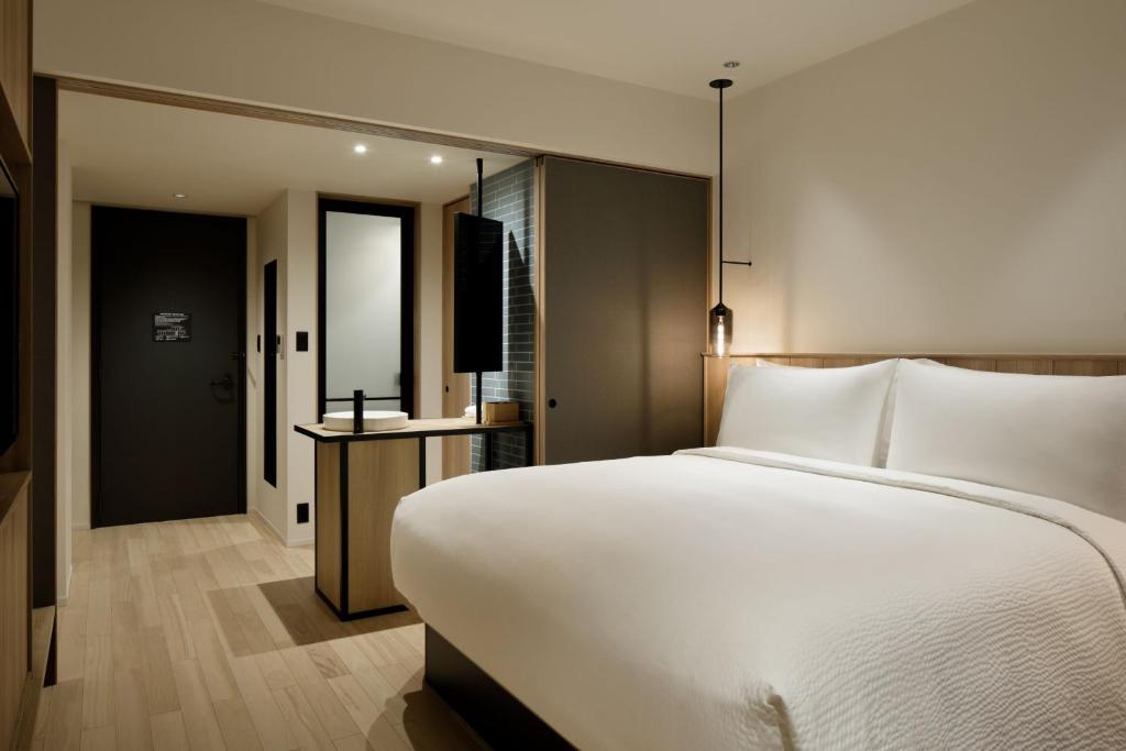 Postel nebo postele na pokoji v ubytování Fairfield by Marriott Gifu Mino