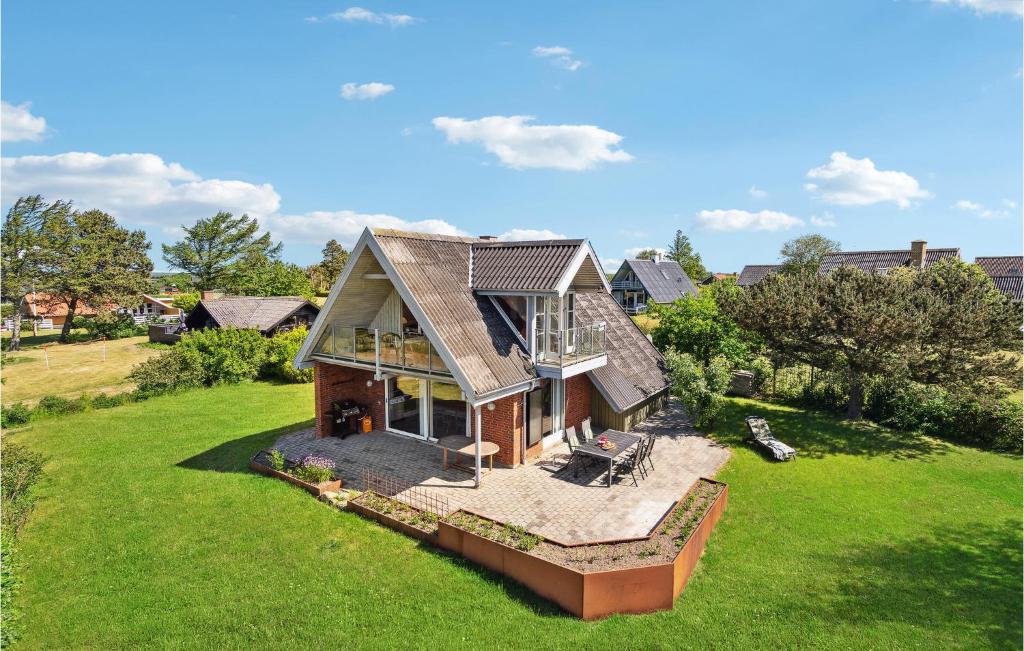 an overhead view of a house on a lawn at Pet Friendly Home In Assens With House A Panoramic View in Assens