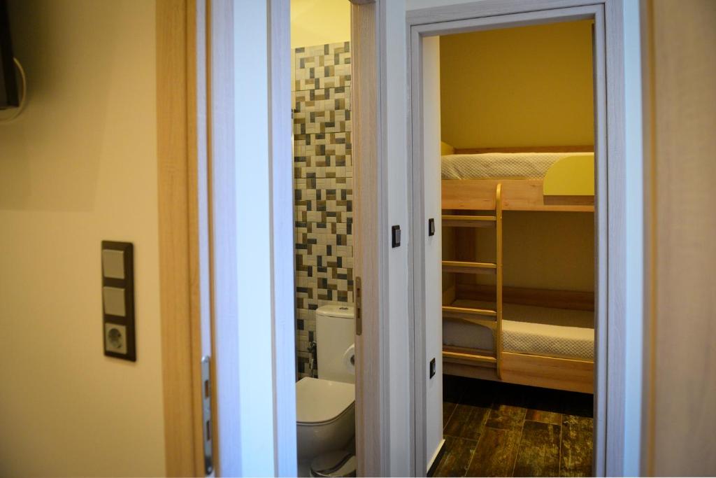 Postel nebo postele na pokoji v ubytování Melina Skiathos