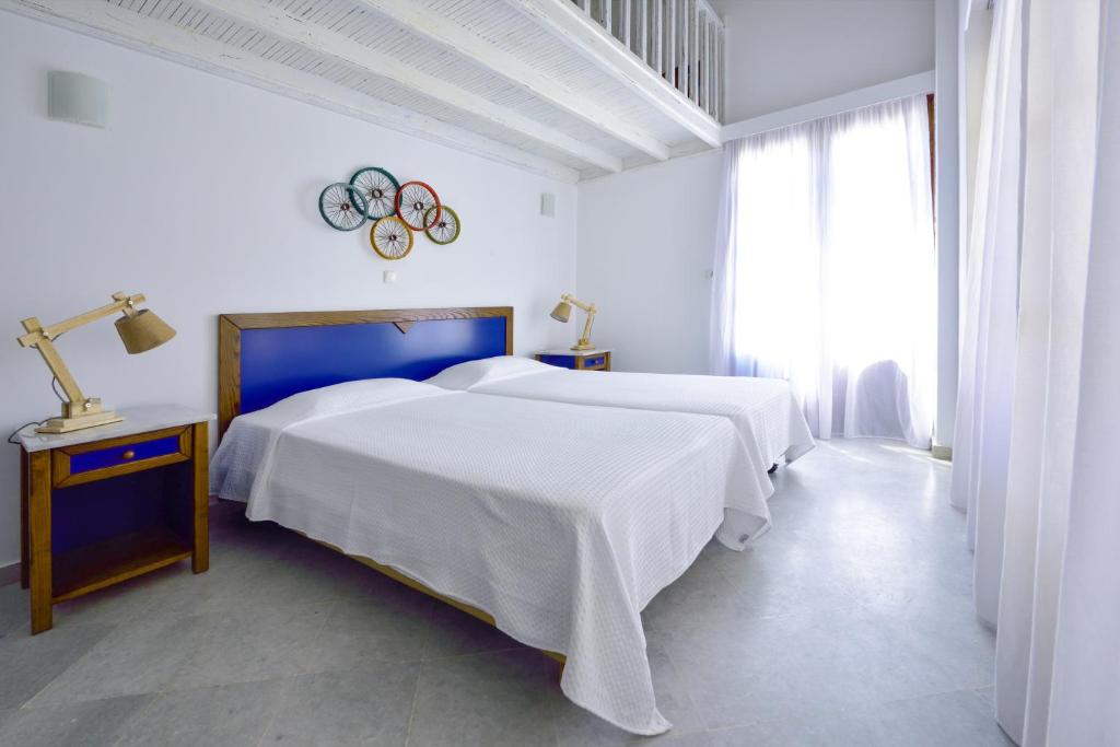 Posteľ alebo postele v izbe v ubytovaní Kalidon beach Hotel