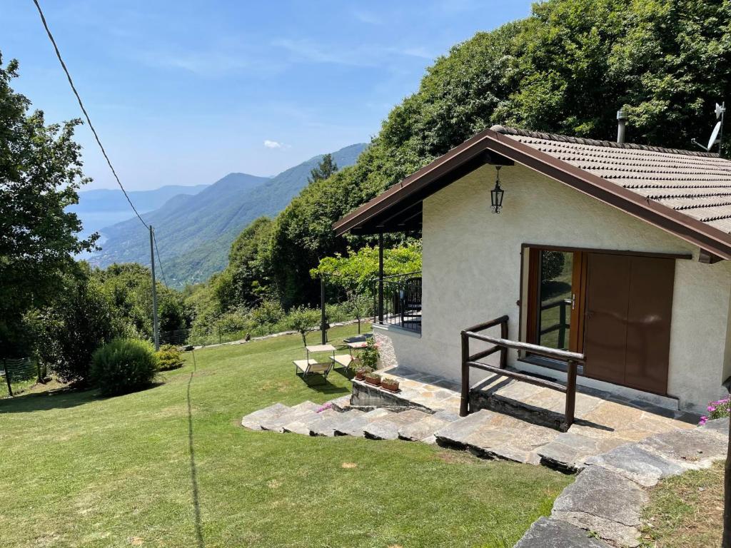 a small house with a view of the mountains at Chalet Baita Lavu' by Interhome in Trarego