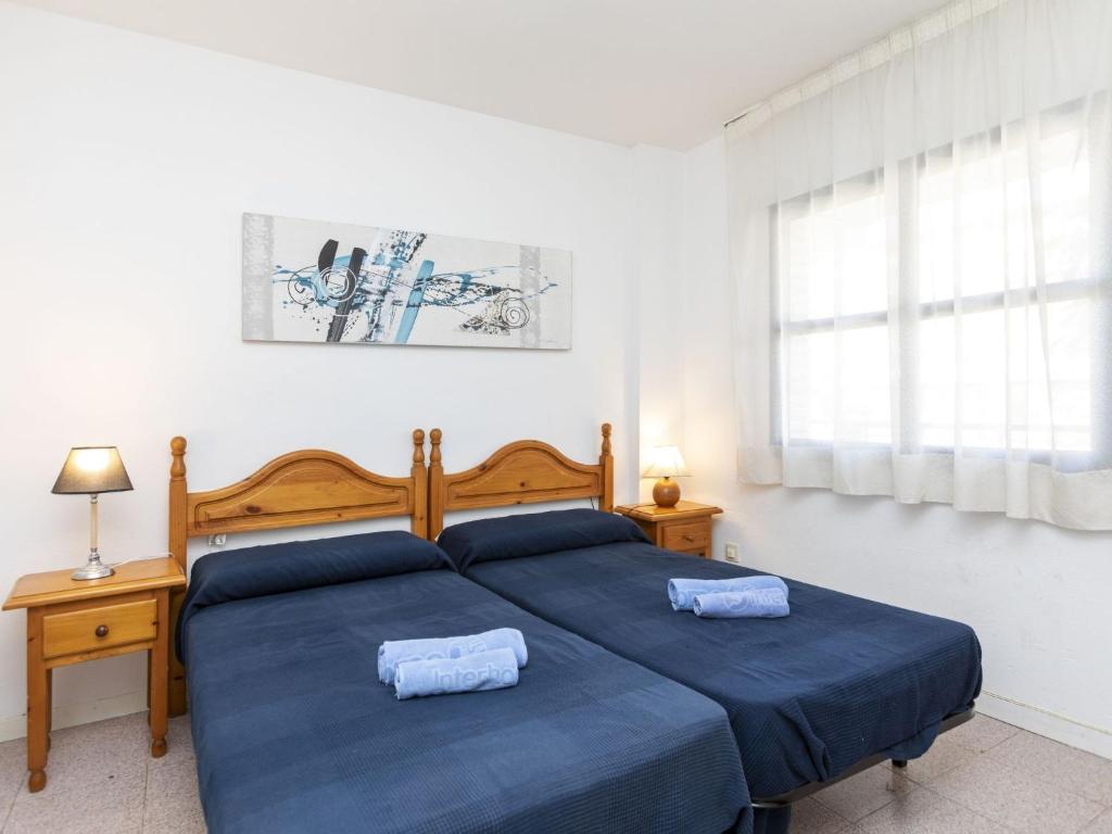 Posteľ alebo postele v izbe v ubytovaní Apartment Riviera Park J 37 by Interhome