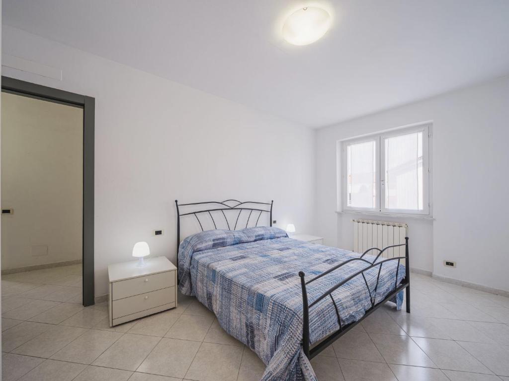 Llit o llits en una habitació de Holiday Home Lucerna Due-3 by Interhome