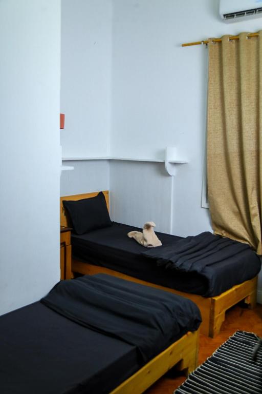 Letto o letti in una camera di Castle Hotel