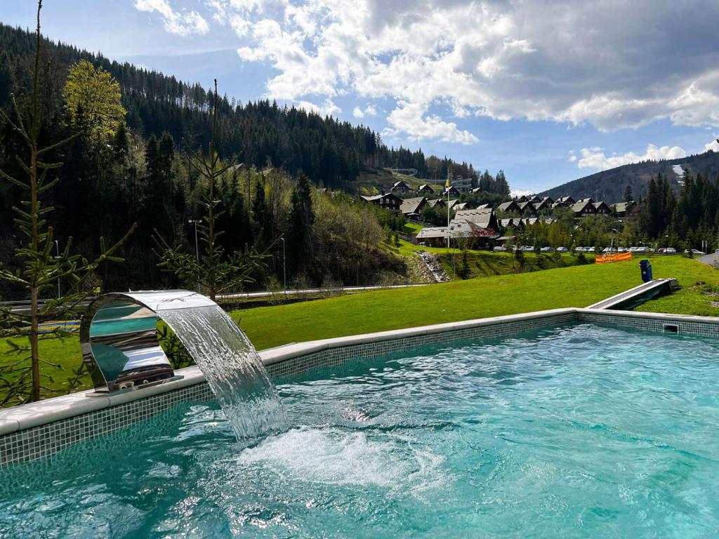 Bazén v ubytování Hotel Skilandhouse nebo v jeho okolí