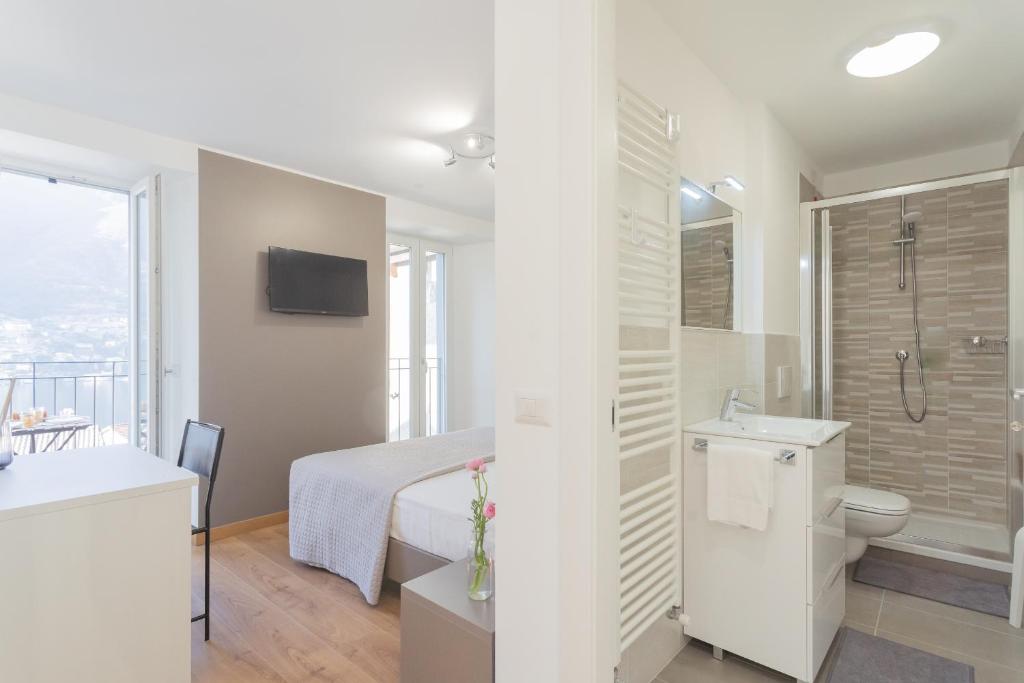 Koupelna v ubytování Pozzo Vertical Apartment with garden and parking by Rent All Como