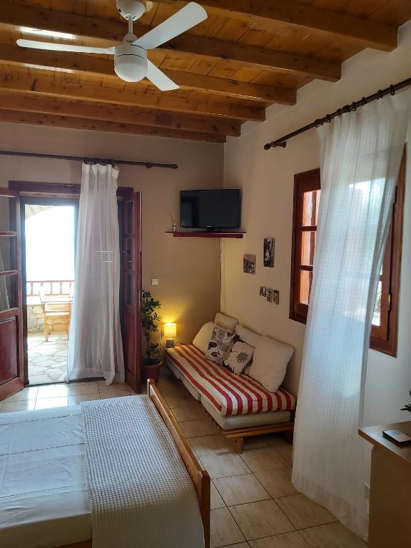 Postel nebo postele na pokoji v ubytování Almyra apt in Mani