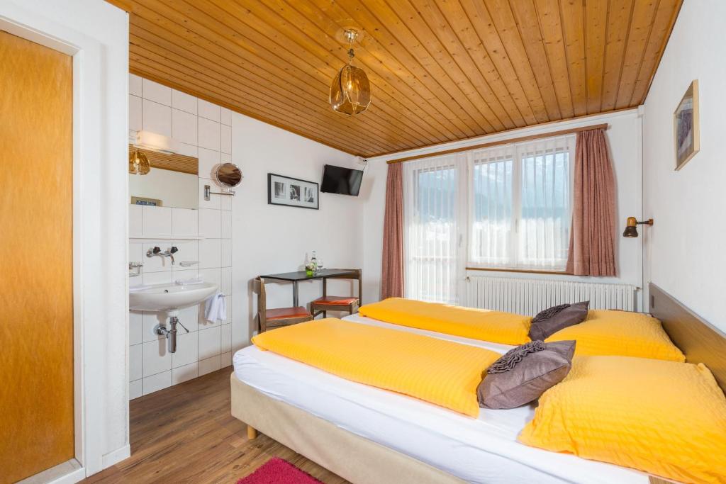 Postel nebo postele na pokoji v ubytování Hotel Park