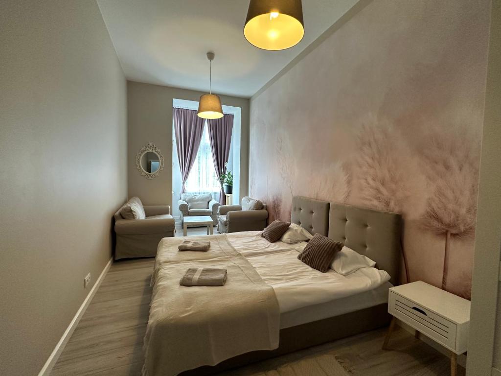 Katil atau katil-katil dalam bilik di Apartament Wroclawia