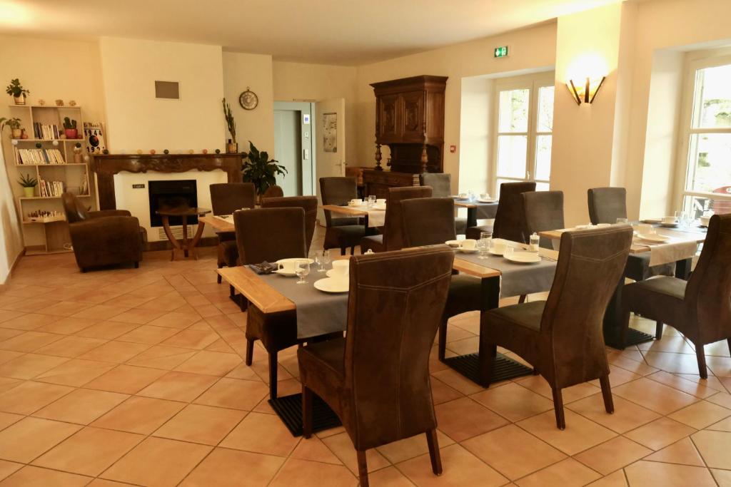 Posezení v ubytování Hôtel Le Quatorze