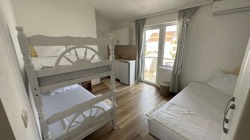 Voodi või voodid majutusasutuse Apartman Hana toas